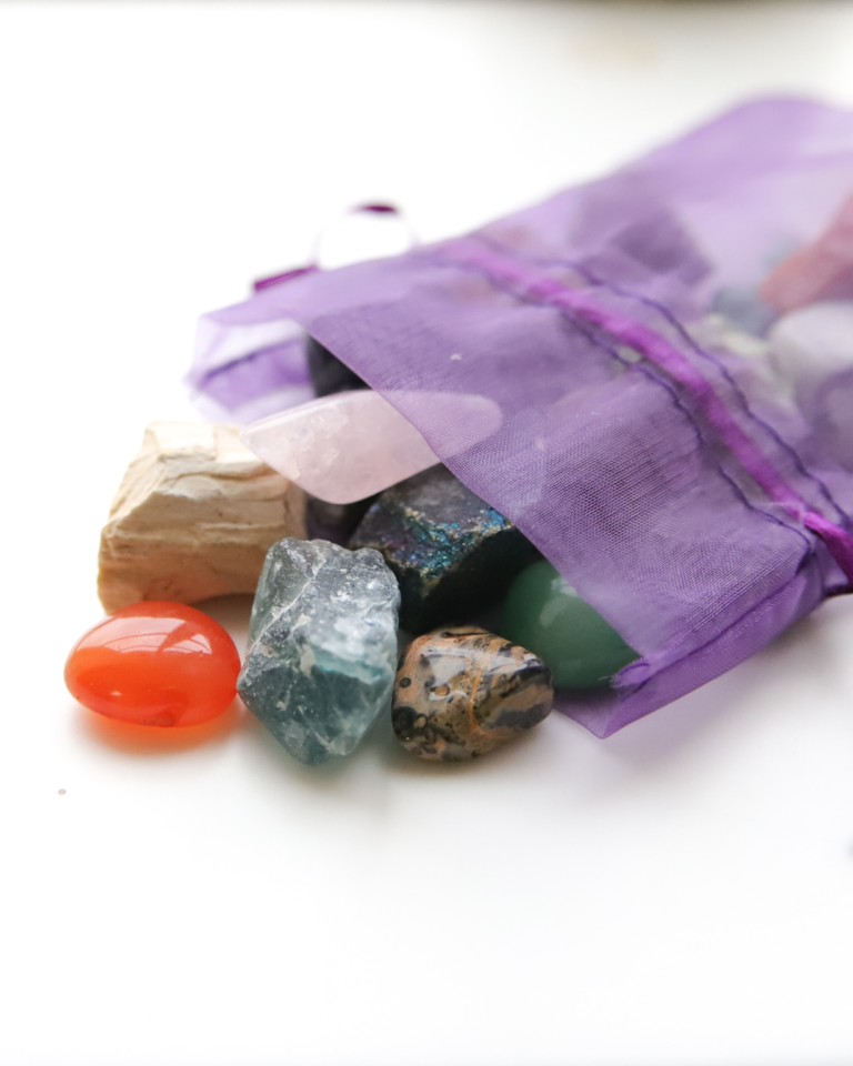 Healing Crystals in a purple bag